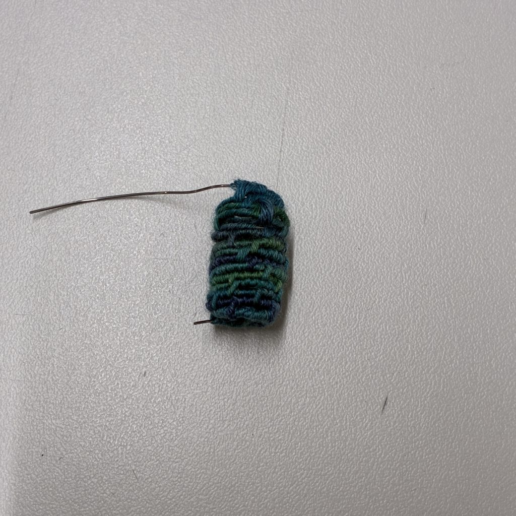 With a coil structure.